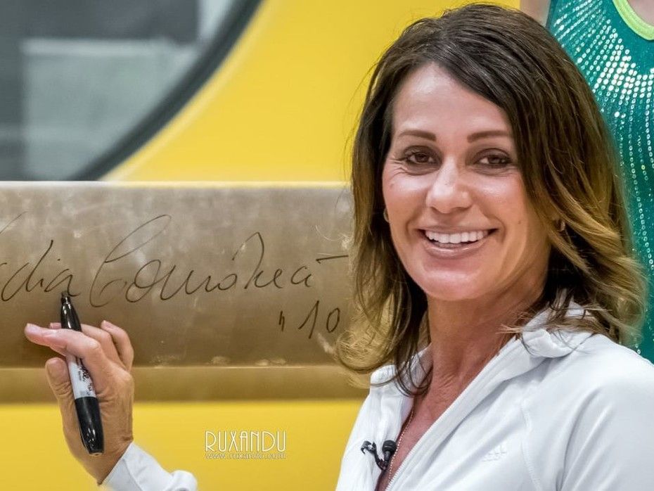 Nadia Comaneci botox boob job body measurements